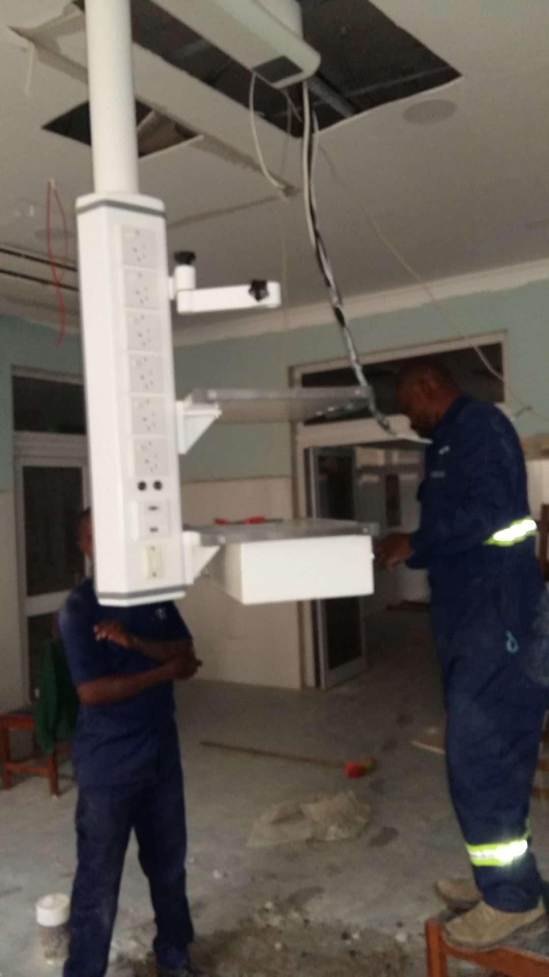 Medical pendant installed in the operating room of RUMA Fertility & Specialist Hospital, Ghana, with gas terminals and power sockets