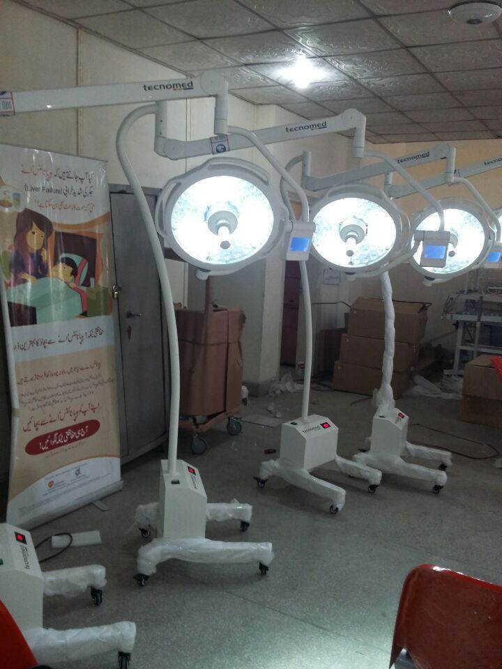 LEDD700/500 ceiling operating light and LEDL500S mobile surgical light installed in a Pakistani military hospital operating room, replacing old halogen surgical lights with cold-light LED technology